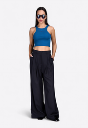 Full view of model wearing navy crop tank top, East Vibe